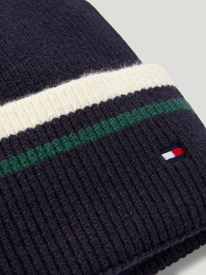 Closeup view of Tommy Hilfiger Dean Pom-Pom Beanie in desert sky