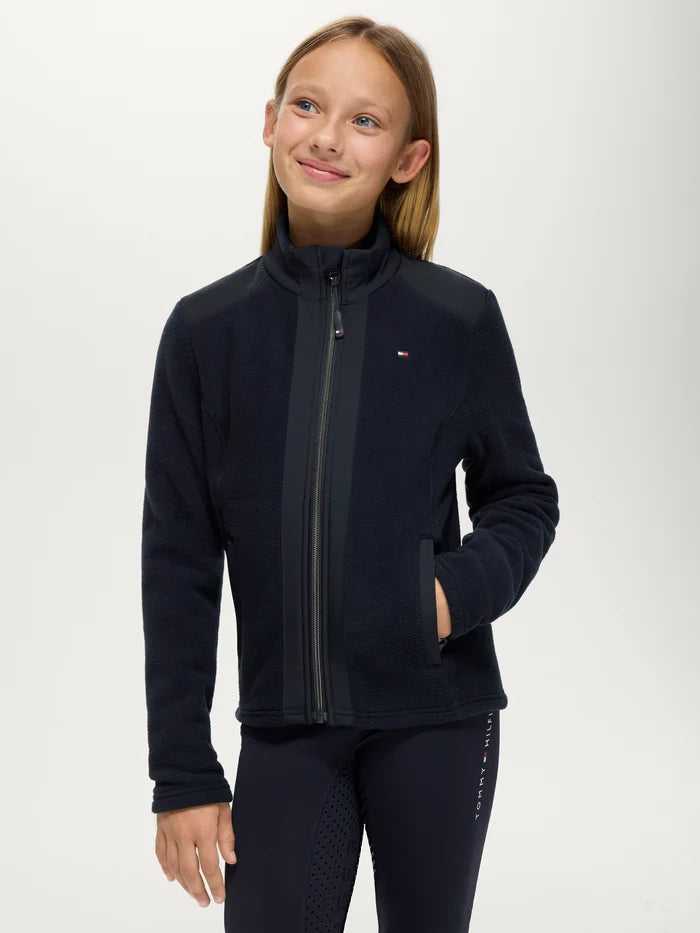 Young girl wearing Tommy Hilfiger Kids' Elmonte Fleece Jacket in Desert Sky
